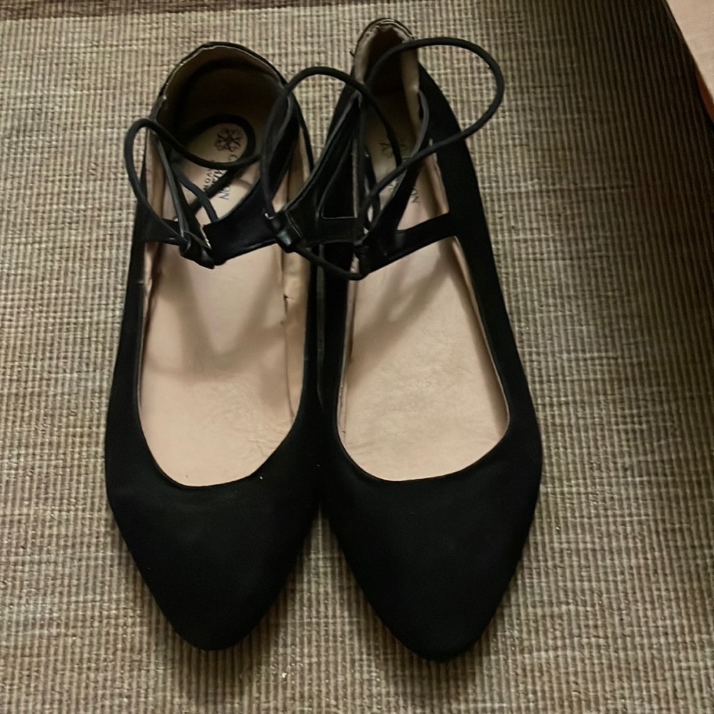POINTED black flats with ankle tie